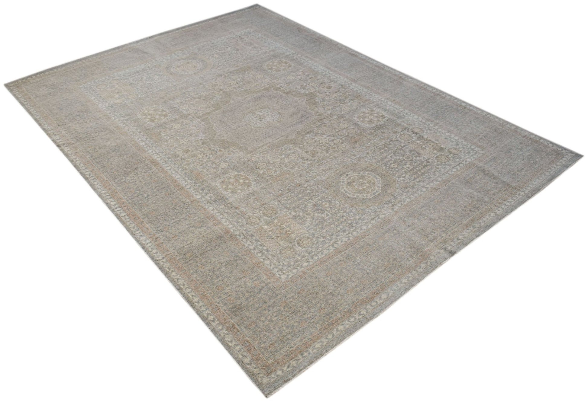 A rectangular Afghan Balkh rug featuring a traditional patterned design in muted neutral tones.