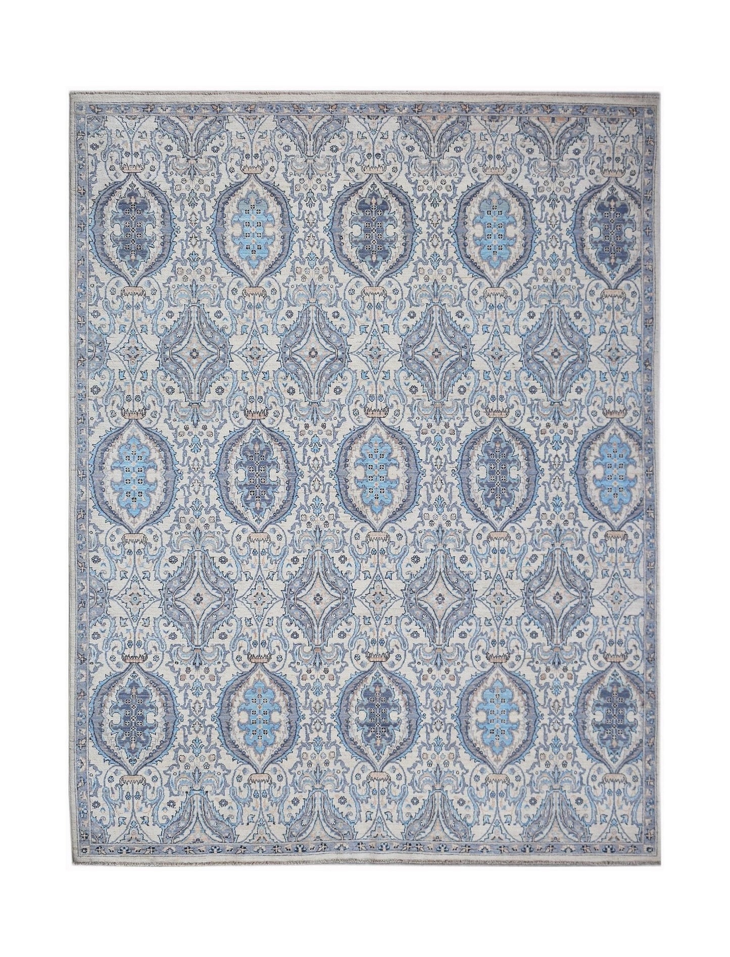 Handwoven Afghan Balkh rug featuring a traditional blue and cream floral medallion pattern.