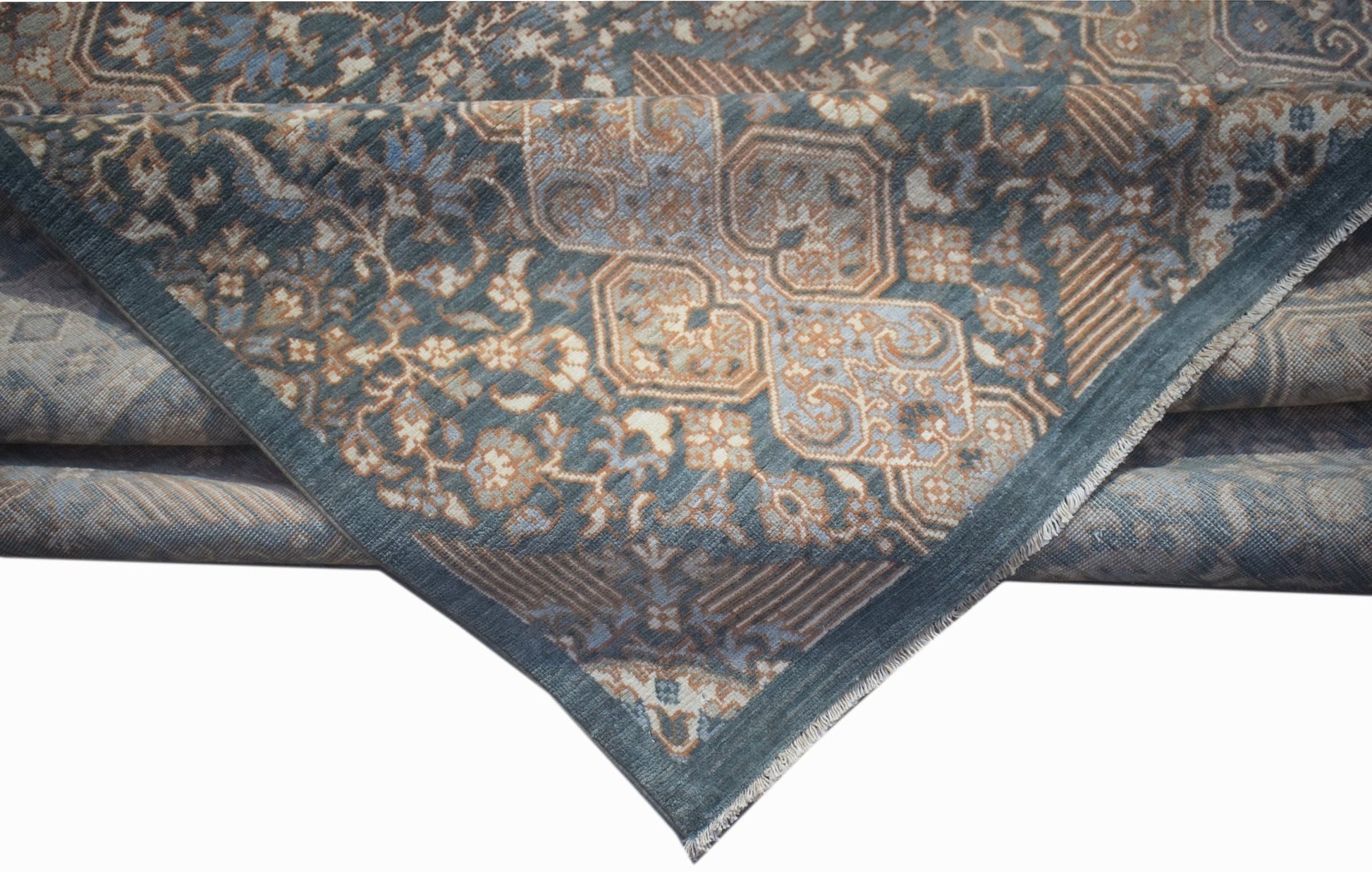 A handwoven Afghan Balkh rug featuring a traditional blue and beige floral pattern.