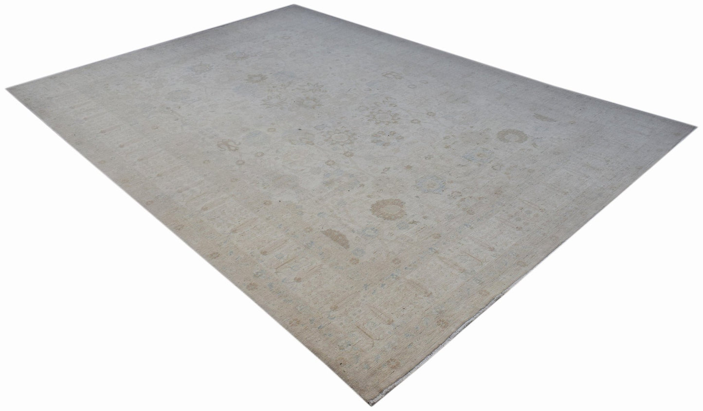 A rectangular, handwoven Afghan Balkh rug featuring a subtle, faded floral pattern in neutral tones.