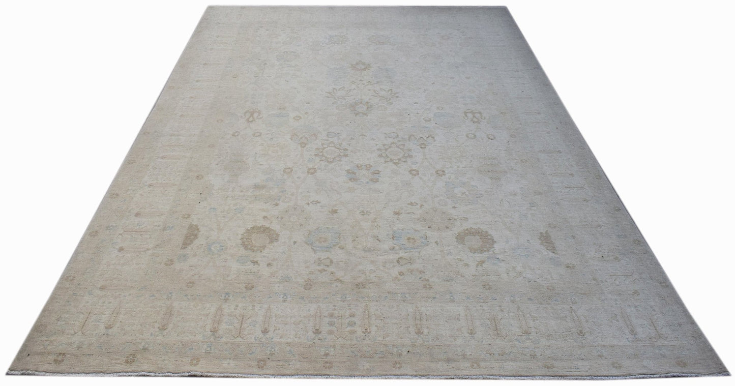A handmade Afghan Balkh rug featuring a subtle, light-toned floral pattern on a wool pile.