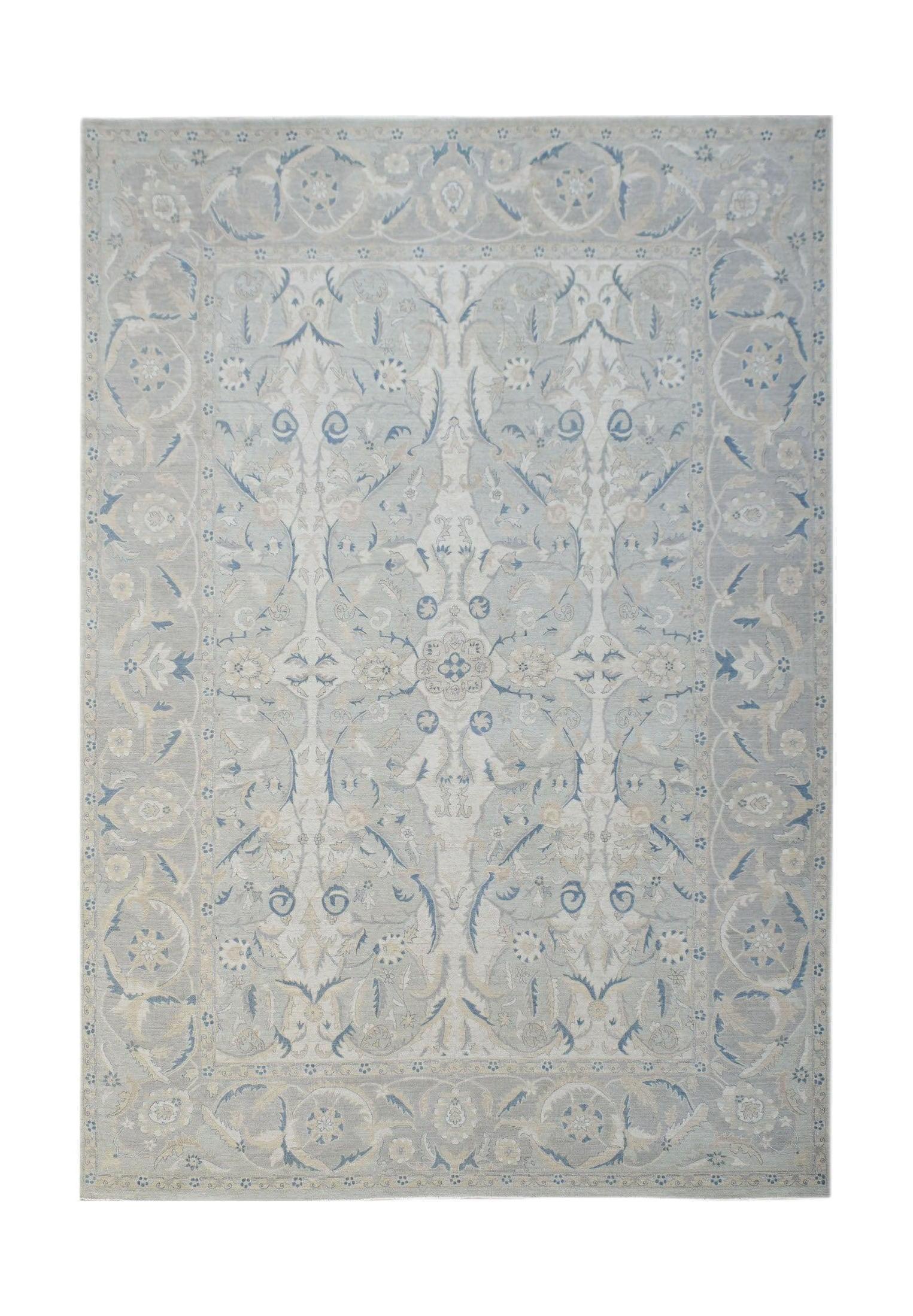 An Afghan Balkh rug featuring a traditional floral pattern in soft blue and beige tones.