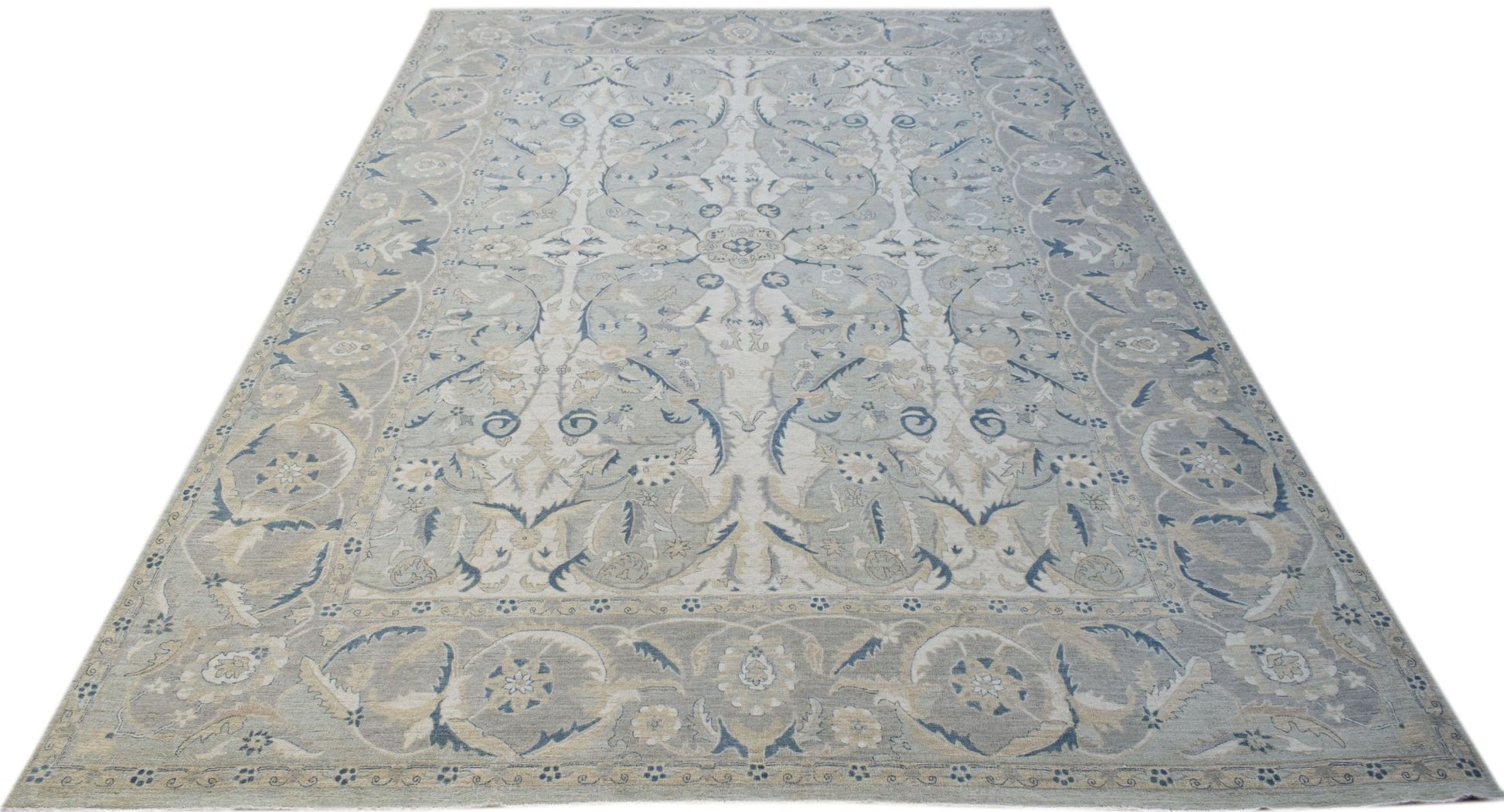 A rectangular Afghan Balkh rug featuring a traditional floral pattern in soft blue and beige tones.