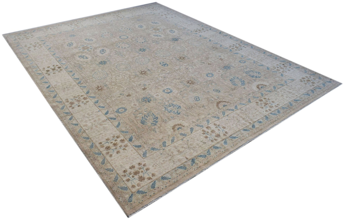 Handwoven Afghan Balkh rug featuring a traditional floral pattern in soft beige and blue tones.