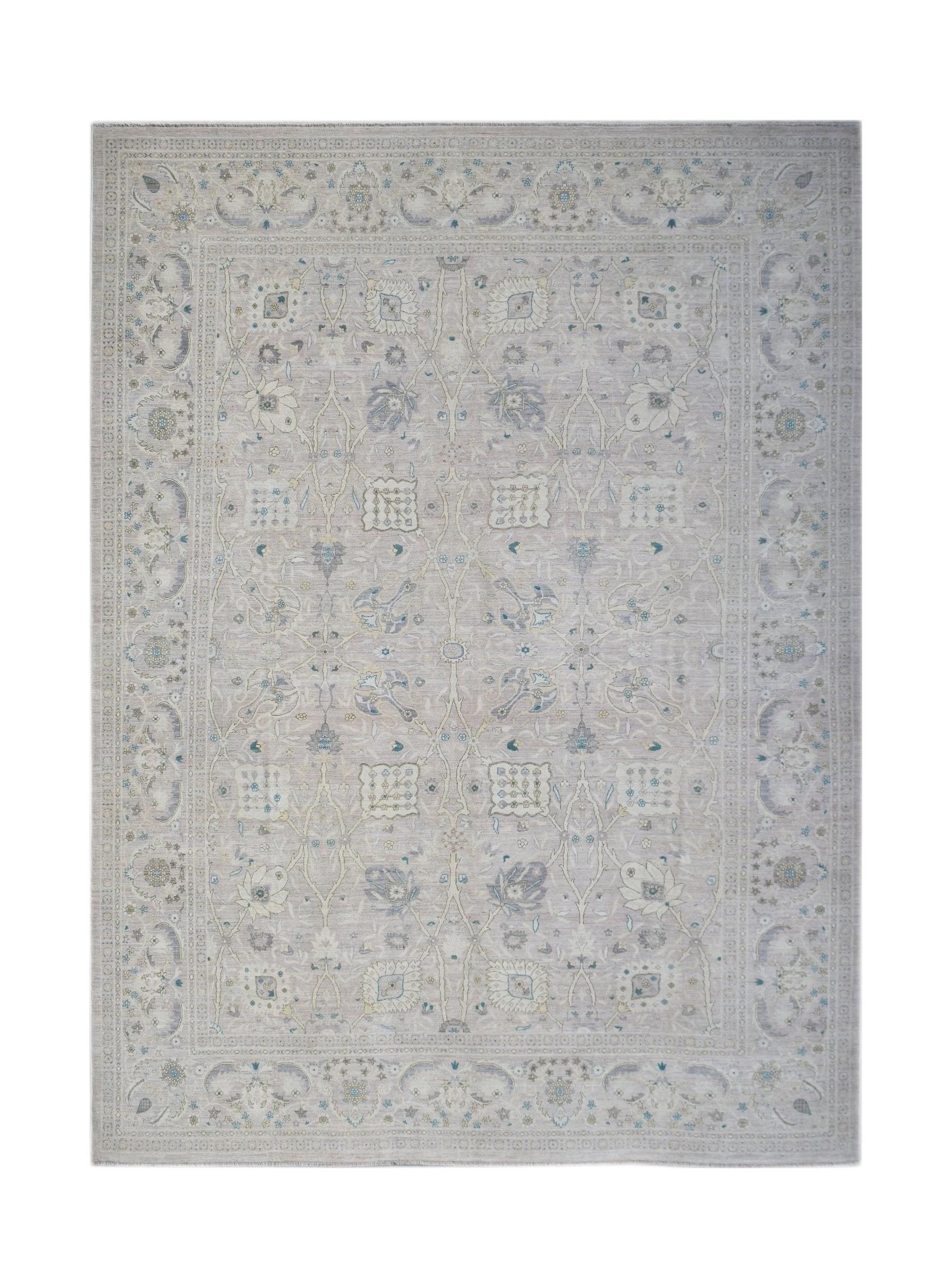 Handwoven Afghan Balkh rug featuring a traditional floral pattern in soft neutral tones.