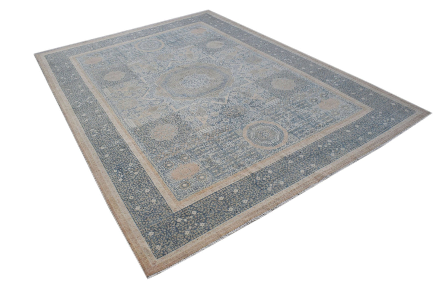 A handwoven Afghan Balkh rug featuring a traditional blue and beige Mamluk medallion pattern.
