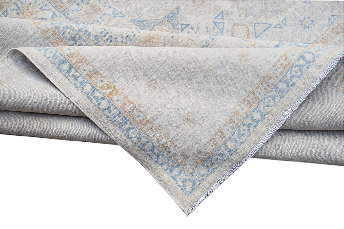 A handwoven Afghan Balkh rug featuring a traditional Mamluk pattern in soft blue and beige tones.
