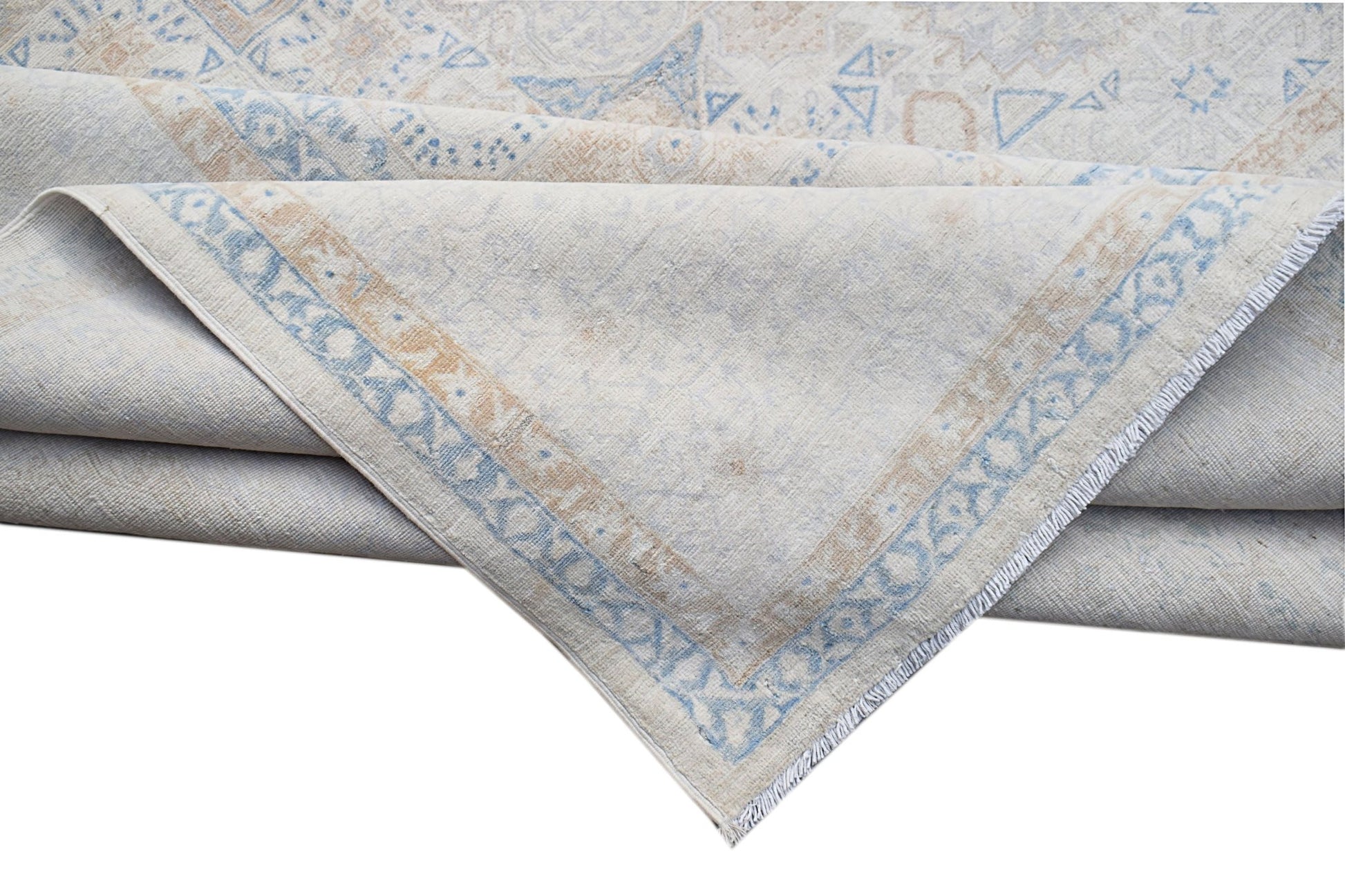 A handwoven Afghan Balkh rug featuring a traditional Mamluk pattern in soft blue and beige tones.