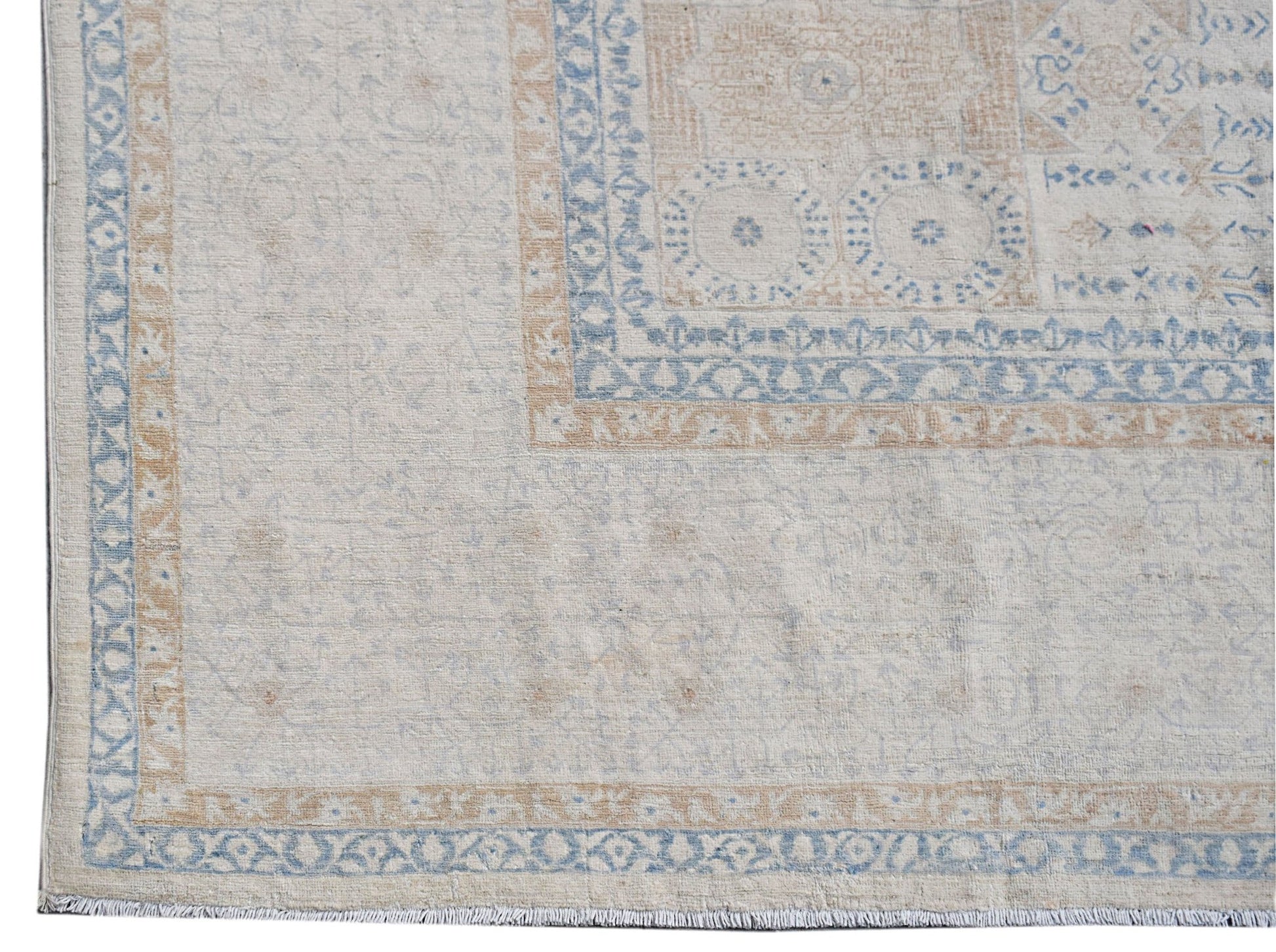 A handwoven Afghan Balkh rug featuring a traditional Mamluk pattern in soft blue and beige tones.