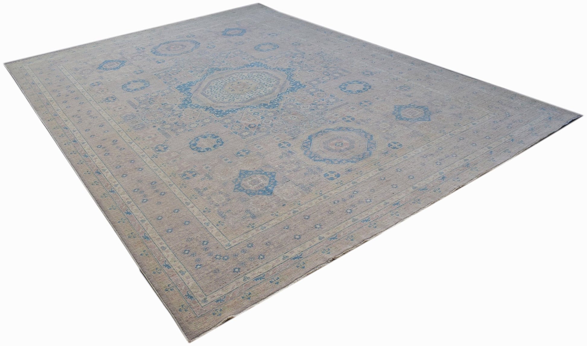 A rectangular Afghan Balkh rug featuring a traditional blue and beige geometric pattern.