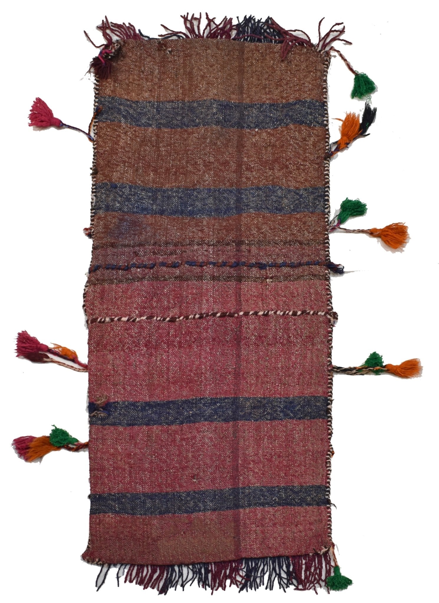 A vintage handmade Afghan wool saddle bag featuring striped patterns and colorful side tassels.
